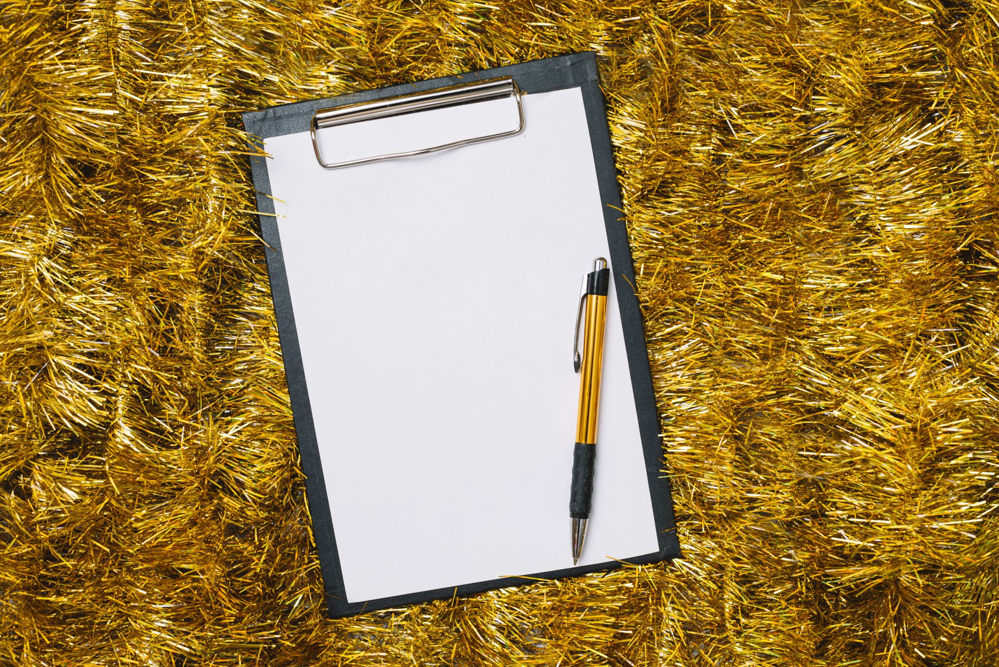clipboard-with-paper-gold-tinsel